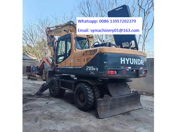 Колісний екскаватор HYUNDAI R210
