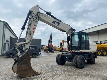 Колісний екскаватор CATERPILLAR M318D