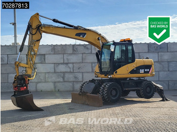 Колісний екскаватор CATERPILLAR M313D