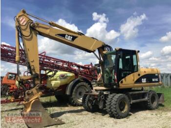 Колісний екскаватор CATERPILLAR M315C