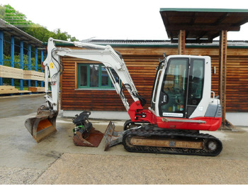 Гусеничний екскаватор TAKEUCHI