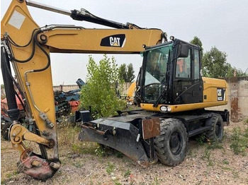 Колісний екскаватор CATERPILLAR M322D