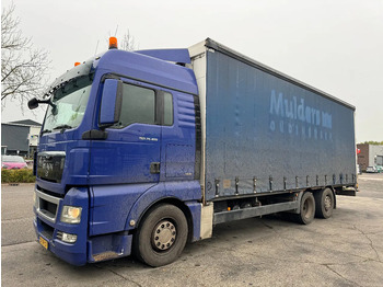 Тентована вантажівка MAN TGX 26.400