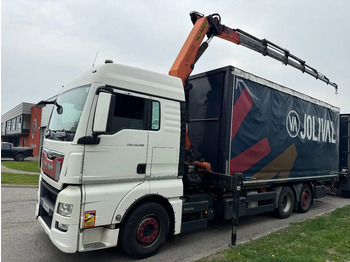 Вантажівка з маніпулятором MAN TGX 26.480