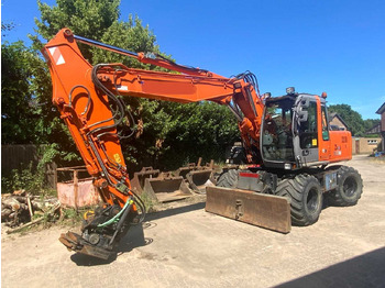 Колісний екскаватор HITACHI ZX160W