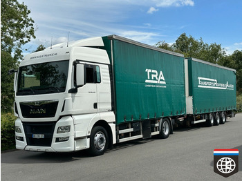 Тентована вантажівка MAN TGX 18.440