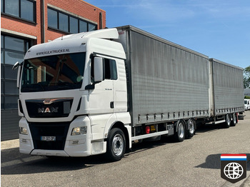 Тентована вантажівка MAN TGX 26.480