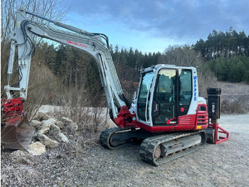 Міні-екскаватор TAKEUCHI