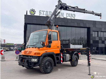 Вантажівка з маніпулятором UNIMOG U300