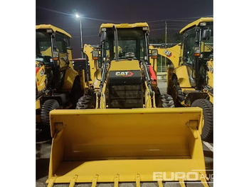 Екскаватор-навантажувач CATERPILLAR