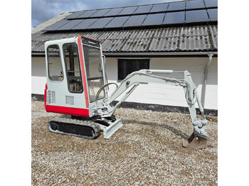 Міні-екскаватор TAKEUCHI