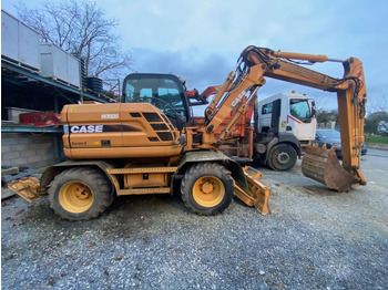 Колісний екскаватор CASE