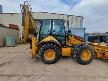 Екскаватор-навантажувач CATERPILLAR