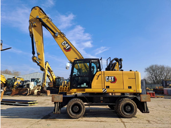 Колісний екскаватор CATERPILLAR MH3024