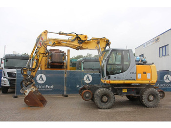 Колісний екскаватор NEW HOLLAND