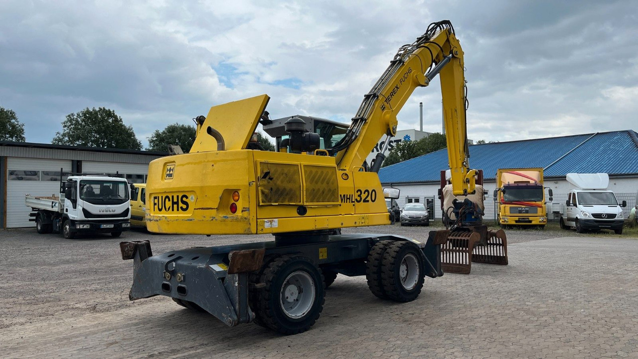 Fuchs TeRex MHL 320 D Umschlagbagger Greifer Pratzen - Перевантажувач: фото 5 Fuchs TeRex MHL 320 D Umschlagbagger Greifer Pratzen - Перевантажувач: фото 5