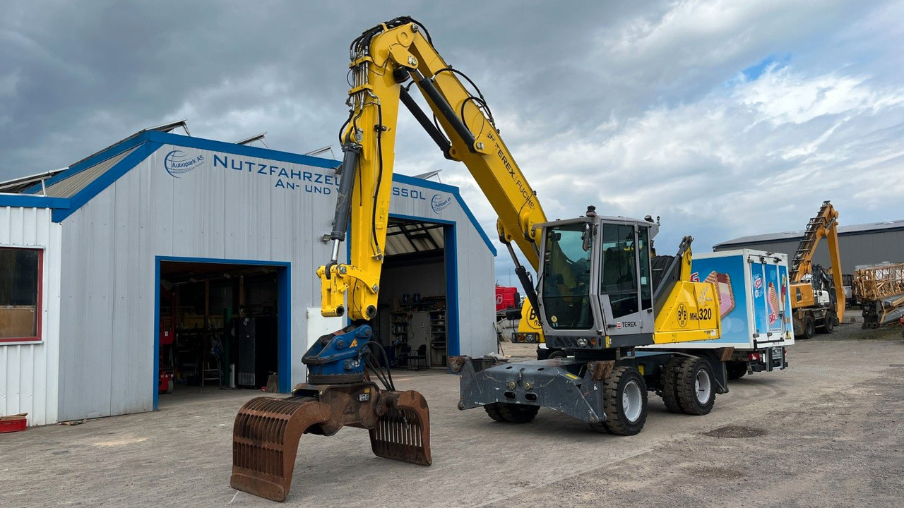 Fuchs TeRex MHL 320 D Umschlagbagger Greifer Pratzen - Перевантажувач: фото 3 Fuchs TeRex MHL 320 D Umschlagbagger Greifer Pratzen - Перевантажувач: фото 3