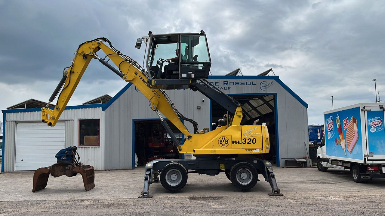 Fuchs TeRex MHL 320 D Umschlagbagger Greifer Pratzen - Перевантажувач: фото 2 Fuchs TeRex MHL 320 D Umschlagbagger Greifer Pratzen - Перевантажувач: фото 2