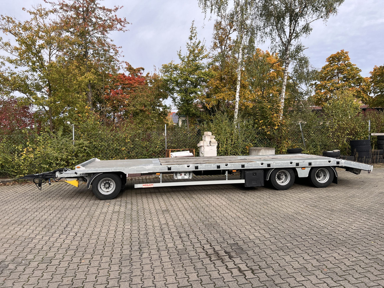 Möslein TO 3 F Schwebheim 3 Achs Tiefladeranhänger - Низькорамна платформа причіп: фото 1 Möslein TO 3 F Schwebheim 3 Achs Tiefladeranhänger - Низькорамна платформа причіп: фото 1