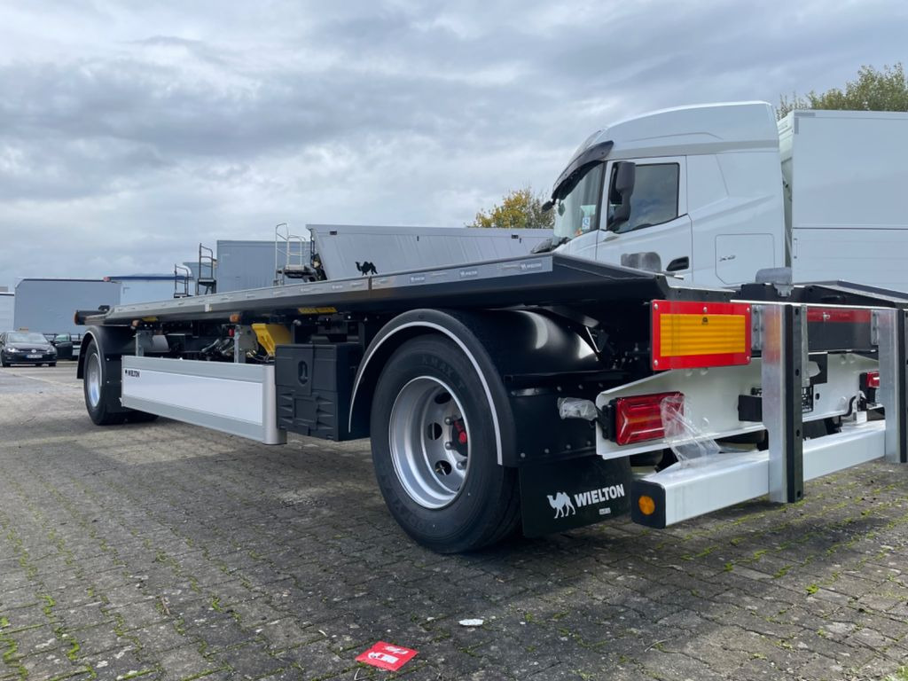 Wielton 2-Achs Außenroller-Abrollanhänger Wielton 2-Achs Außenroller-Abrollanhänger - Причіп мультиліфт/ Бункеровоз: фото 3 Wielton 2-Achs Außenroller-Abrollanhänger Wielton 2-Achs Außenroller-Abrollanhänger - Причіп мультиліфт/ Бункеровоз: фото 3