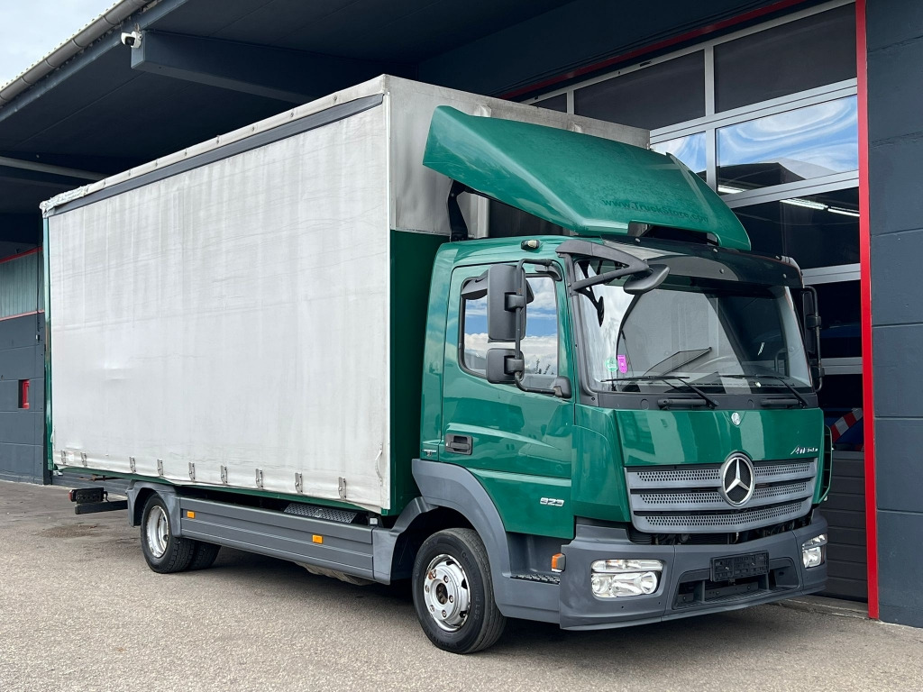 Mercedes-Benz Atego 823 Euro6 Klima 6,1m P+P AHK Orig. 164.tkm - Тентований фургон: фото 1 Mercedes-Benz Atego 823 Euro6 Klima 6,1m P+P AHK Orig. 164.tkm - Тентований фургон: фото 1