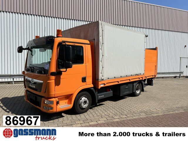 MAN TGL 7.180 4X2 BL mit LBW BÄR - Бортова вантажівка/ Платформа: фото 1 MAN TGL 7.180 4X2 BL mit LBW BÄR - Бортова вантажівка/ Платформа: фото 1
