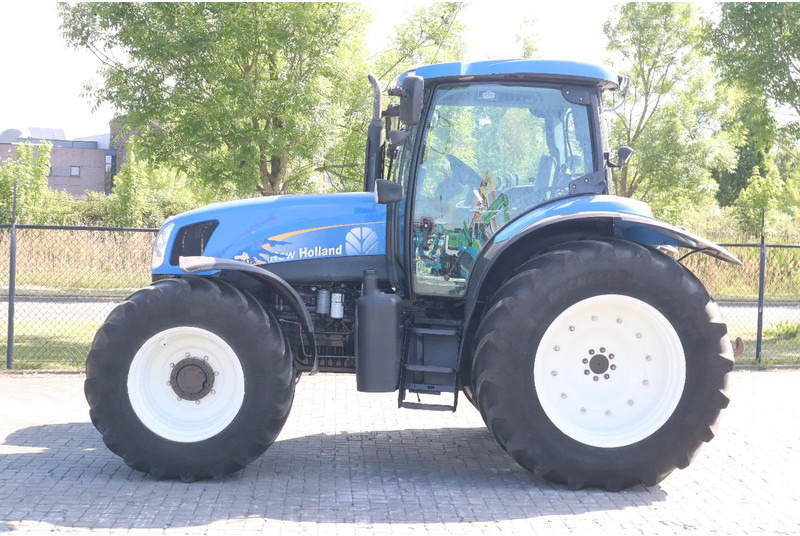 New Holland TS135A | 40 KM/H | 4X4 | SUPERSTEER - Трактор: фото 2 New Holland TS135A | 40 KM/H | 4X4 | SUPERSTEER - Трактор: фото 2