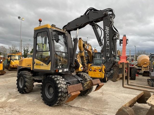Mecalac 12 MTX - Колісний екскаватор: фото 1 Mecalac 12 MTX - Колісний екскаватор: фото 1
