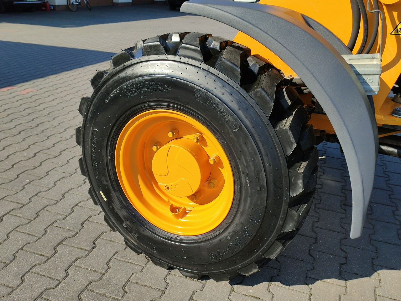 Компактний фронтальний навантажувач Liebherr L 506 STEREO Szybkozłącze / Łyżka Krokodyl + Widły Waga 6300kg: фото 13