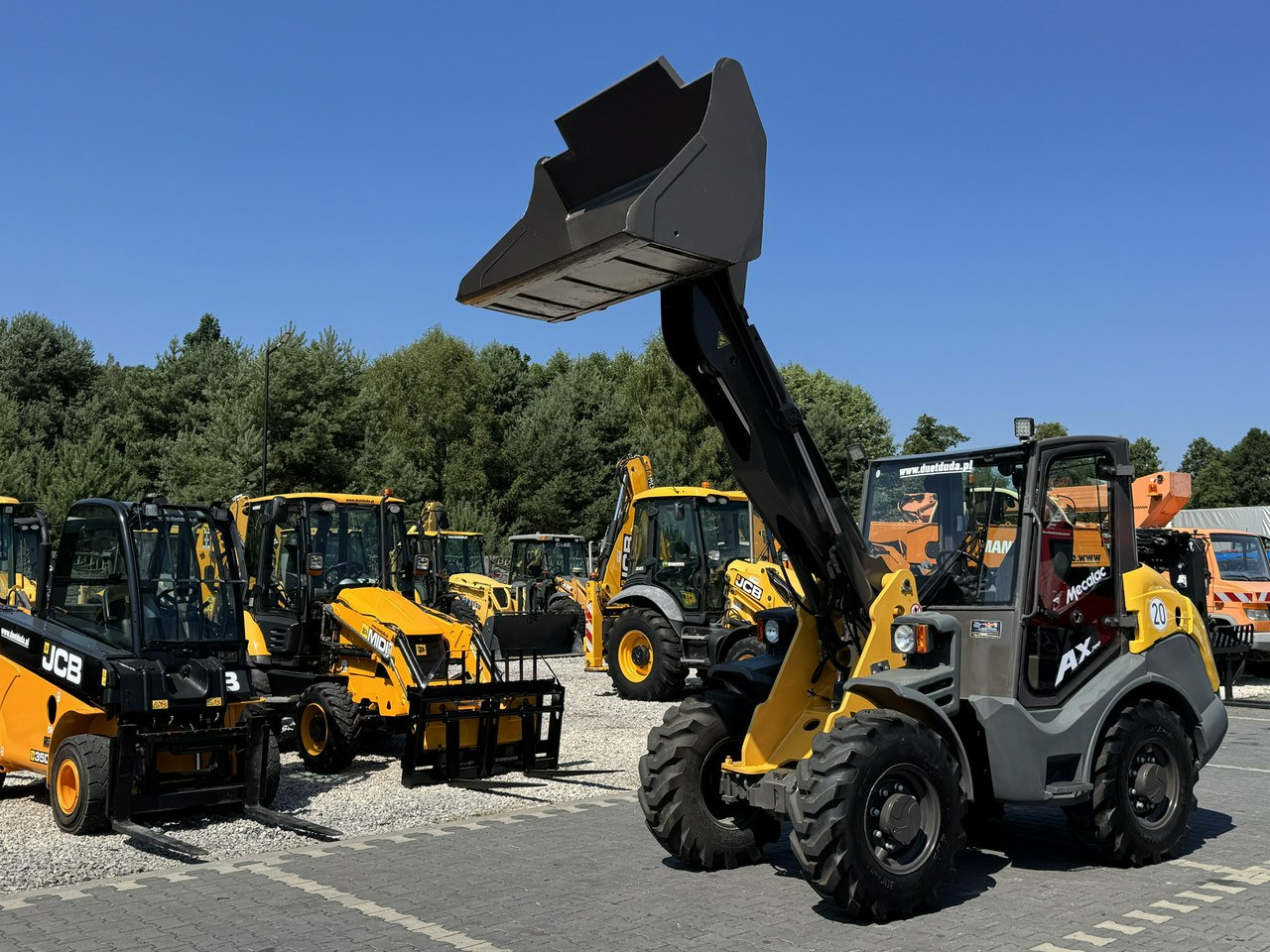 Mecalac AX 700 Szybko-Złącze Łyżka Super Stan - Колісний навантажувач: фото 1 Mecalac AX 700 Szybko-Złącze Łyżka Super Stan - Колісний навантажувач: фото 1