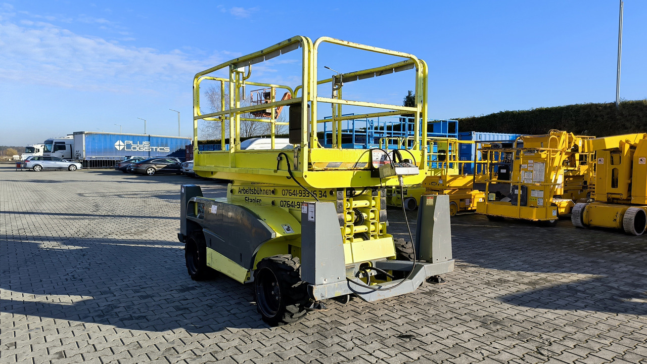 HAULOTTE Compact 12 DX - Ножичний підйомник: фото 1 HAULOTTE Compact 12 DX - Ножичний підйомник: фото 1