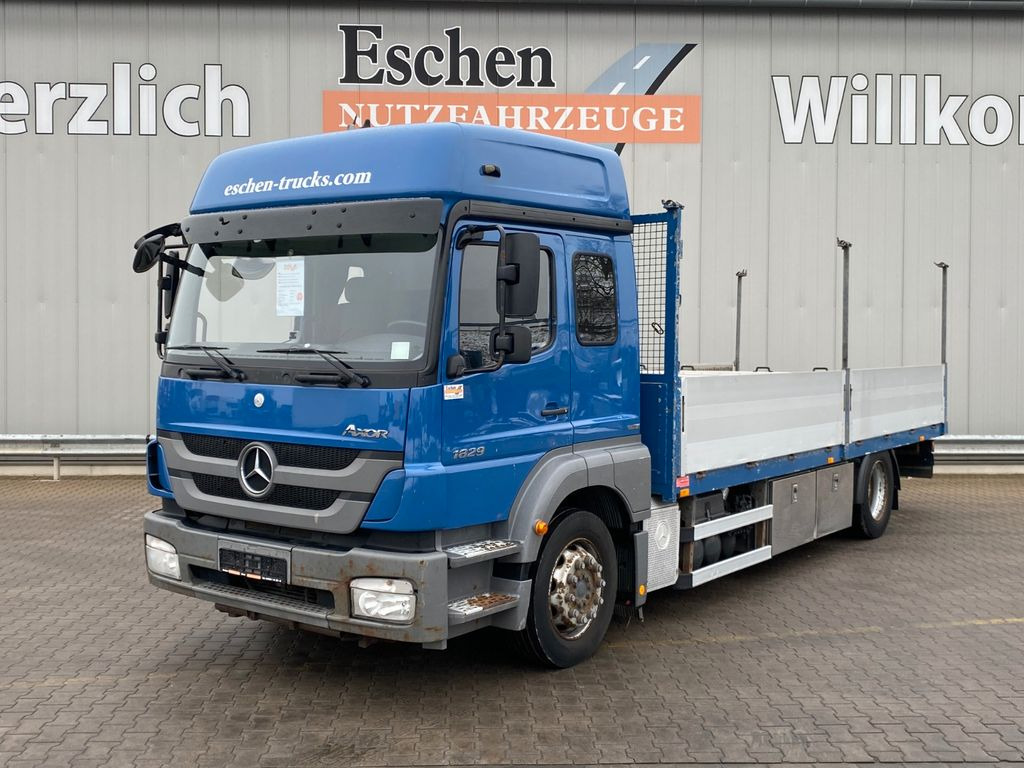 Mercedes-Benz Axor 1829 LL 6,55m Pritsche*6 Sitze*Klima*AHK - Бортова вантажівка/ Платформа: фото 1 Mercedes-Benz Axor 1829 LL 6,55m Pritsche*6 Sitze*Klima*AHK - Бортова вантажівка/ Платформа: фото 1