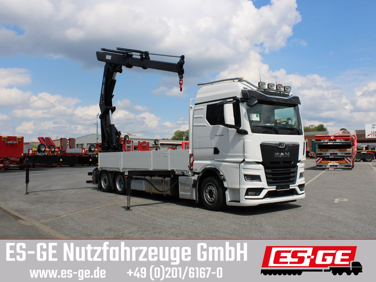 MAN TGX 26.480 6x2-4 LL CH mit MKG HLK531 a5 - Бортова вантажівка/ Платформа, Вантажівка з маніпулятором: фото 3 MAN TGX 26.480 6x2-4 LL CH mit MKG HLK531 a5 - Бортова вантажівка/ Платформа, Вантажівка з маніпулятором: фото 3