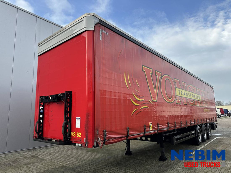 Kögel SN 24 Curtainsider - Pritsche Plane / Sliding roof - Тентований напівпричіп: фото 1 Kögel SN 24 Curtainsider - Pritsche Plane / Sliding roof - Тентований напівпричіп: фото 1