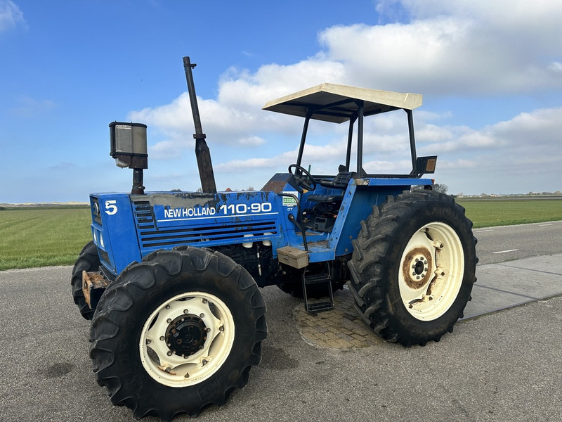 New Holland 110-90 DT - Трактор: фото 1 New Holland 110-90 DT - Трактор: фото 1