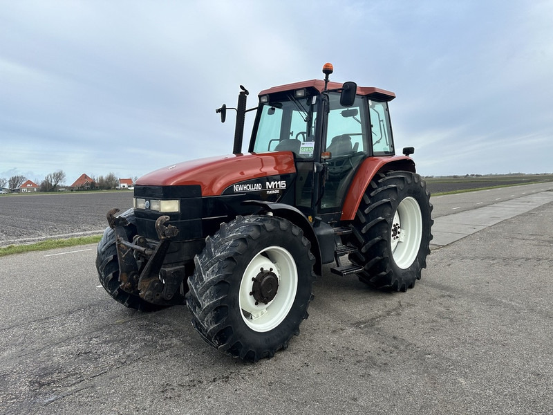 Трактор New Holland M115: фото 1