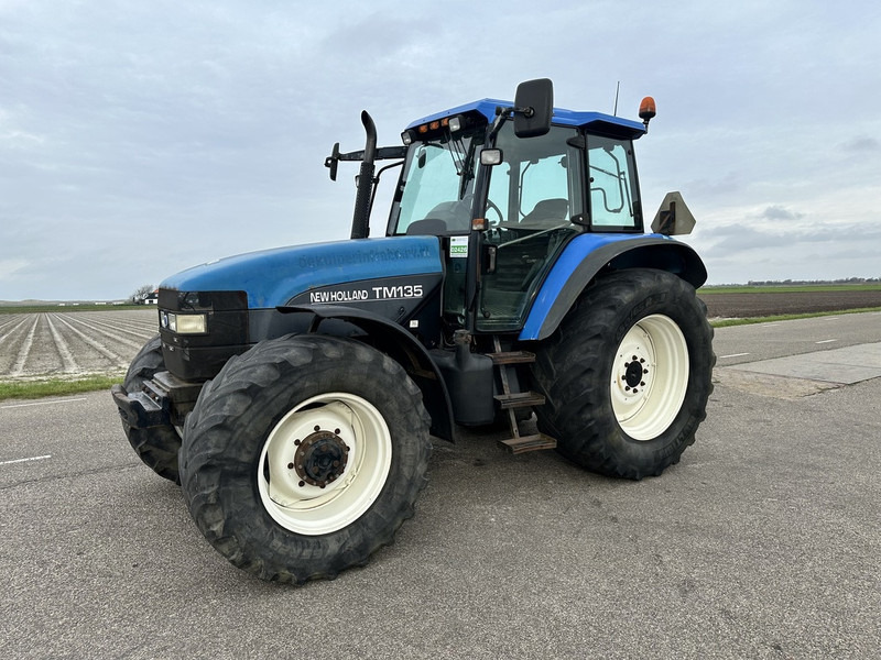 New Holland TM 135 - Трактор: фото 1 New Holland TM 135 - Трактор: фото 1