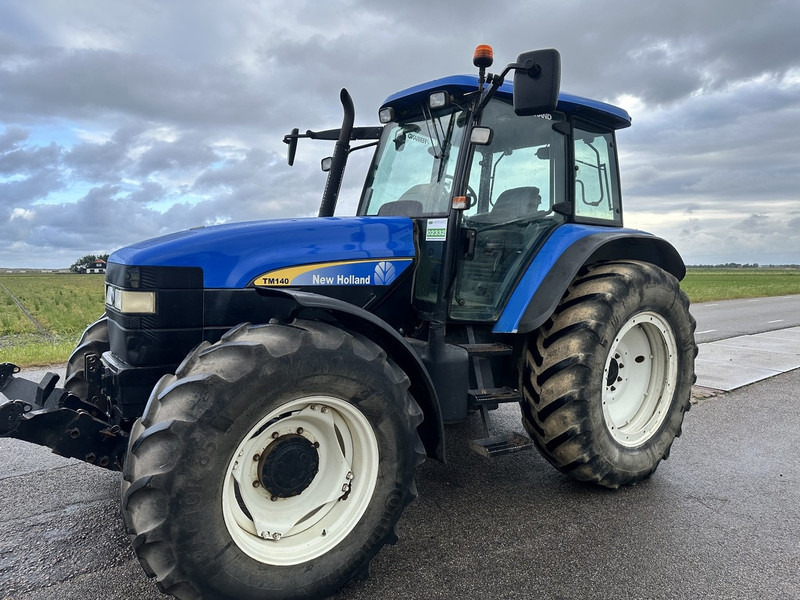 New Holland TM 140 - Трактор: фото 1 New Holland TM 140 - Трактор: фото 1