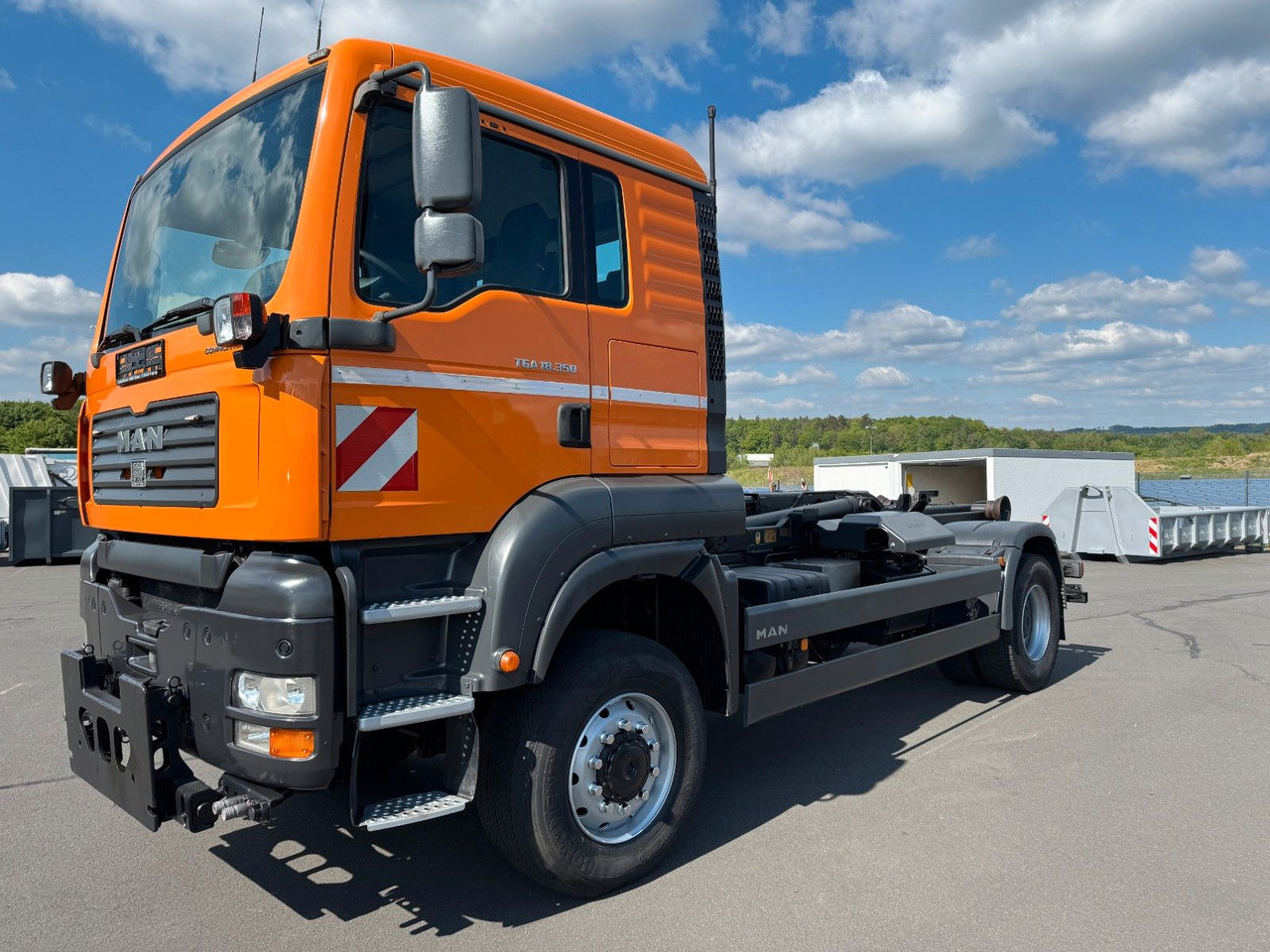 MAN TGA 18.350 4x4 Meiler Abroller RK 14.45 Winterd. - Гаковий мультиліфт вантажівка: фото 1 MAN TGA 18.350 4x4 Meiler Abroller RK 14.45 Winterd. - Гаковий мультиліфт вантажівка: фото 1