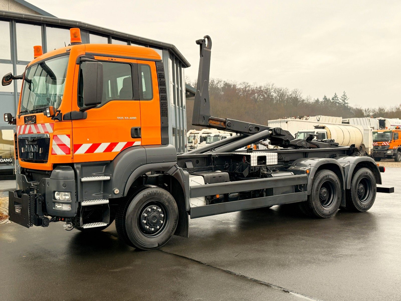 MAN TGS 33.400 6x6 Blattfederung Original 120500 km - Гаковий мультиліфт вантажівка: фото 1 MAN TGS 33.400 6x6 Blattfederung Original 120500 km - Гаковий мультиліфт вантажівка: фото 1