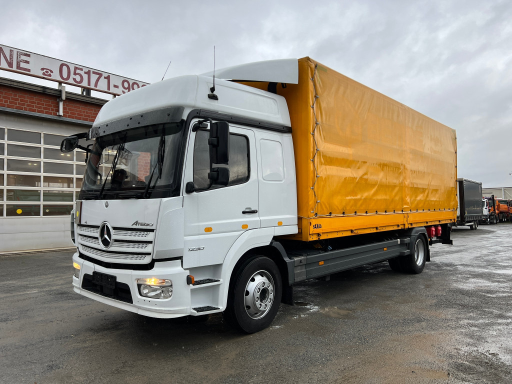 MERCEDES-BENZ Atego 1230 L Pritsche LBW Lg.Fhs Hochd. 7,2m+LBW - Тентована вантажівка: фото 1 MERCEDES-BENZ Atego 1230 L Pritsche LBW Lg.Fhs Hochd. 7,2m+LBW - Тентована вантажівка: фото 1