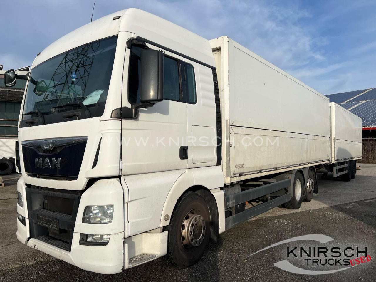 MAN TGA 26.480 Schwenkwandaufbau mit Böhm - Для перевезення напоїв вантажівка: фото 1 MAN TGA 26.480 Schwenkwandaufbau mit Böhm - Для перевезення напоїв вантажівка: фото 1