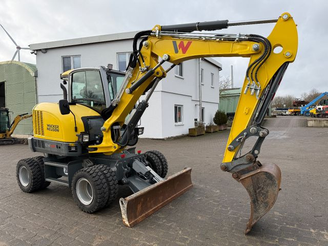 Wacker EW 65, Bj 23, 1200 BH, hydr. VA, Klima, wie neu - Колісний екскаватор: фото 1 Wacker EW 65, Bj 23, 1200 BH, hydr. VA, Klima, wie neu - Колісний екскаватор: фото 1