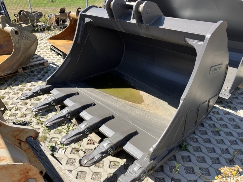 Volvo Tieflöffel mit Zähne S2 - Екскаватор-навантажувач: фото 1 Volvo Tieflöffel mit Zähne S2 - Екскаватор-навантажувач: фото 1