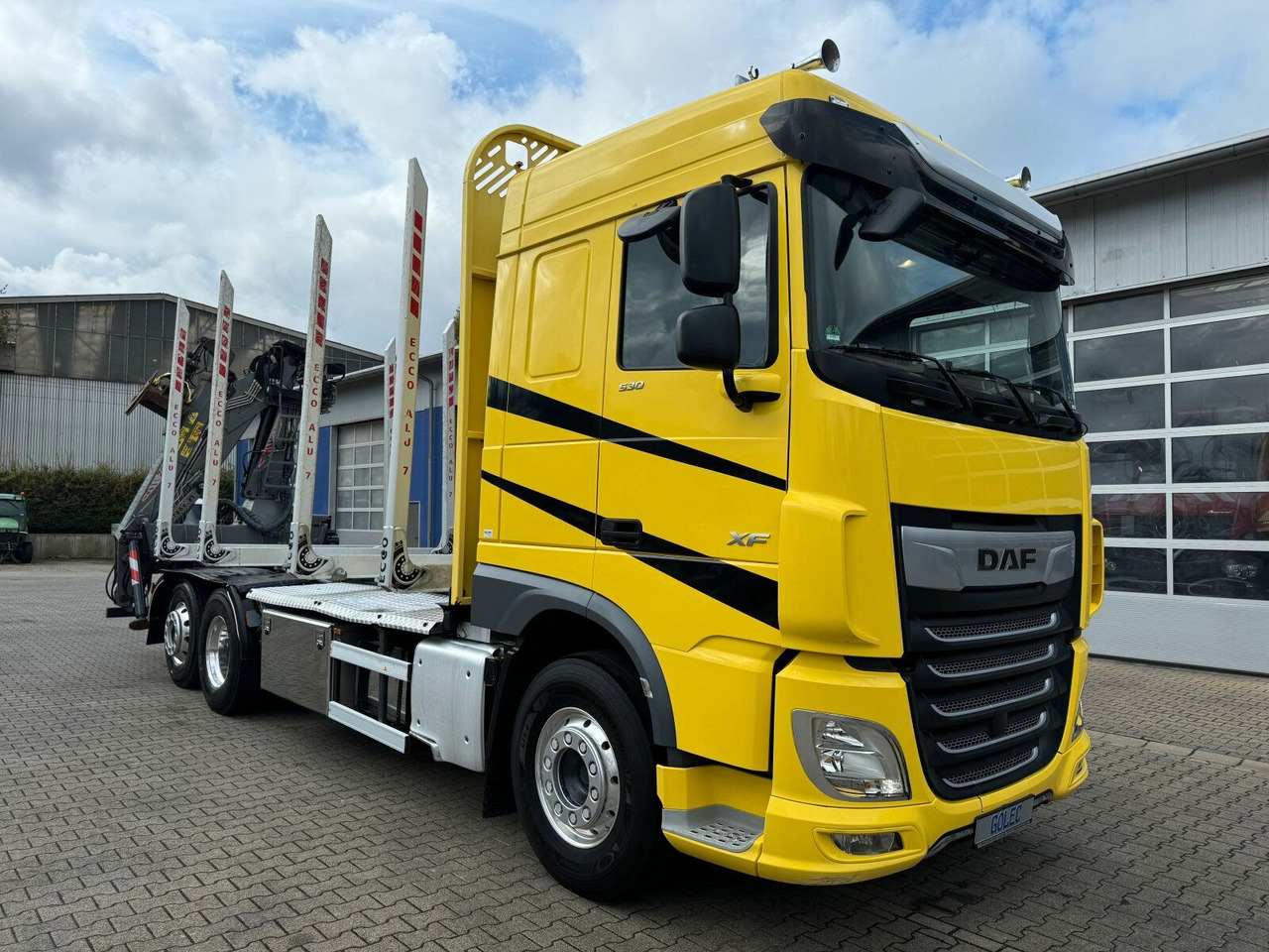 DAF XF 530 6x2 Holztransport Kran PENZ 15Z9.50 *Anh. - Лісовоз, Вантажівка з маніпулятором: фото 1 DAF XF 530 6x2 Holztransport Kran PENZ 15Z9.50 *Anh. - Лісовоз, Вантажівка з маніпулятором: фото 1