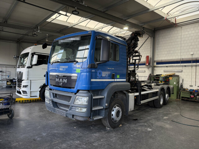 MAN TGS 26.320 6x2 Abrollkipper + Kran HIAB 166 E-5 - Гаковий мультиліфт вантажівка, Вантажівка з маніпулятором: фото 1 MAN TGS 26.320 6x2 Abrollkipper + Kran HIAB 166 E-5 - Гаковий мультиліфт вантажівка, Вантажівка з маніпулятором: фото 1