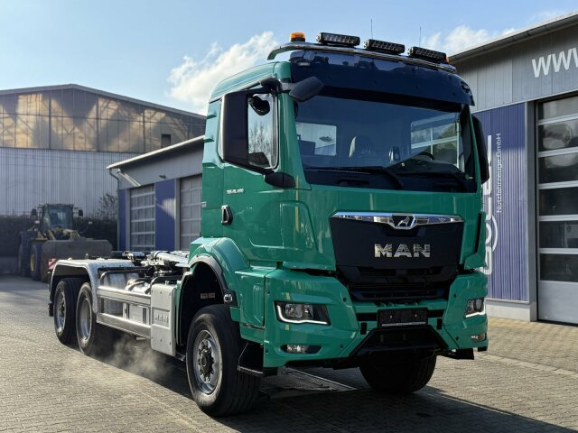 MAN TGS 28.480 6x4 Abrollkipper Meiller RS21.65 - Гаковий мультиліфт вантажівка: фото 1 MAN TGS 28.480 6x4 Abrollkipper Meiller RS21.65 - Гаковий мультиліфт вантажівка: фото 1