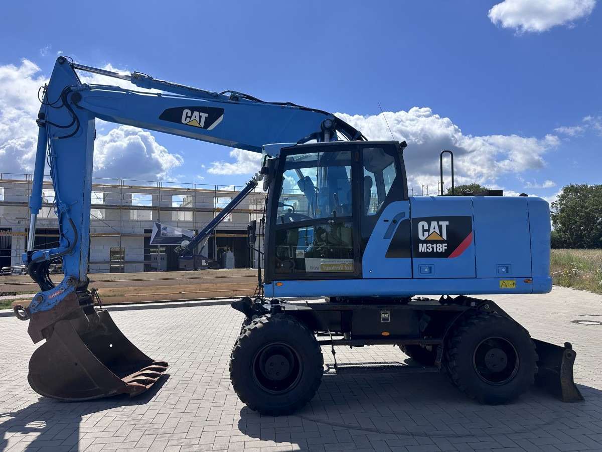 CATERPILLAR M 318 F Oil Quick OQ 65 Deutsche Maschine Top ! - Колісний екскаватор: фото 1 CATERPILLAR M 318 F Oil Quick OQ 65 Deutsche Maschine Top ! - Колісний екскаватор: фото 1