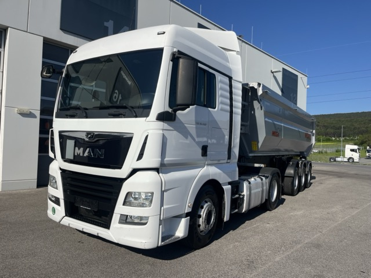 MAN TGX 18.460 4x2 BLS mit Kipphydraulik Euro6 Klima - Тягач: фото 1 MAN TGX 18.460 4x2 BLS mit Kipphydraulik Euro6 Klima - Тягач: фото 1