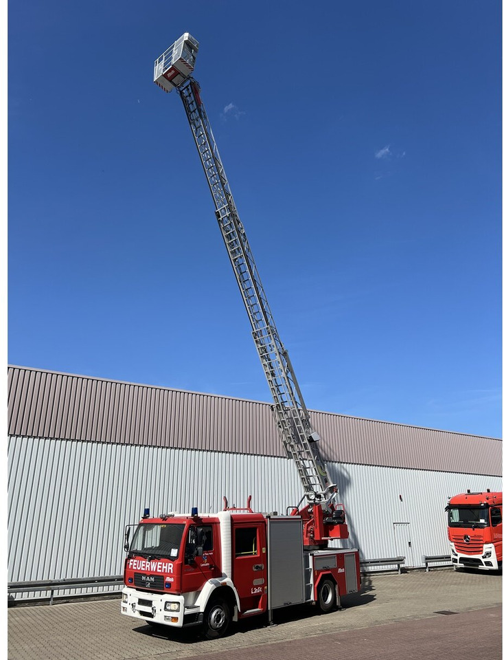 MAN LE 15.255 4x2 LLC Doka, Metz DLA-K 12/9 Drehleiter LE 15.255 4x2 LLC Doka, Metz DLA-K 12/9 Feuerwehr Drehleiter - Карета швидкої допомоги: фото 1 MAN LE 15.255 4x2 LLC Doka, Metz DLA-K 12/9 Drehleiter LE 15.255 4x2 LLC Doka, Metz DLA-K 12/9 Feuerwehr Drehleiter - Карета швидкої допомоги: фото 1